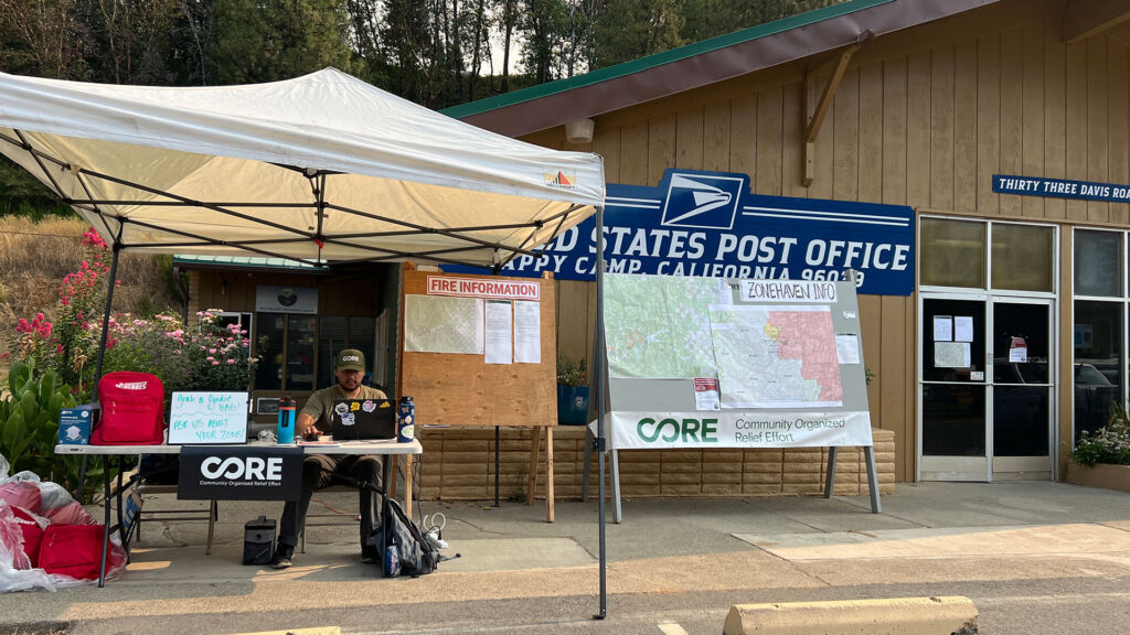 CORE staff set up outside the post office in Siskiyou county, providing information about assistance to community members.