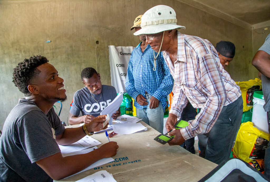 CORE team distributes food kits to community members in Delmas 19, Port-au-Prince. (Photo by CORE)