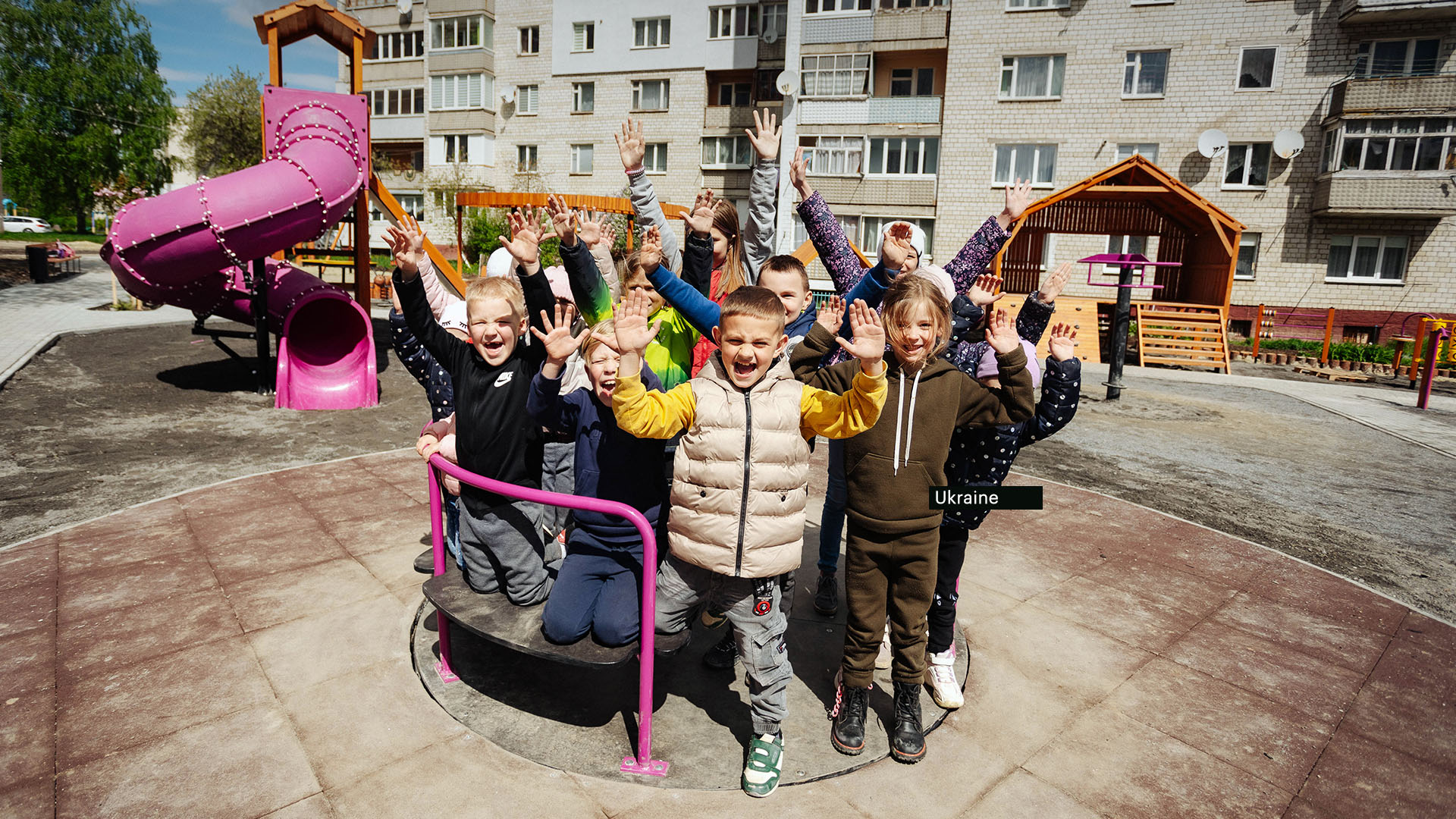 Ukrainian children in a playground playing.