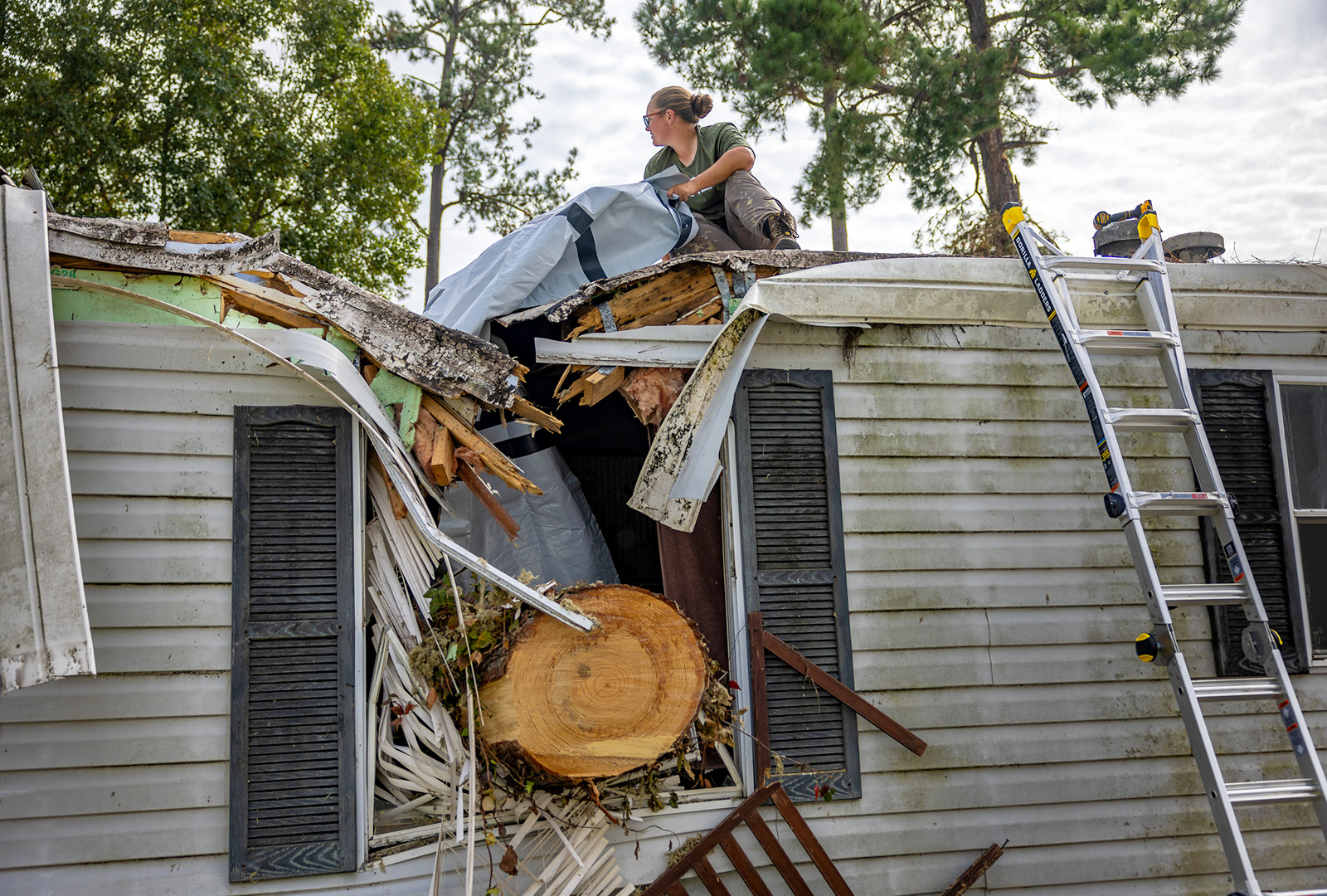 A CORE team member begins tarping a home during CORE’s Hurricane Helene Response in Georgia.