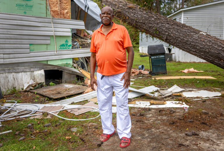 Reverend Arnold McCoggle stands in front of his destroyed home during CORE’s Hurricane Helene Response in Georgia