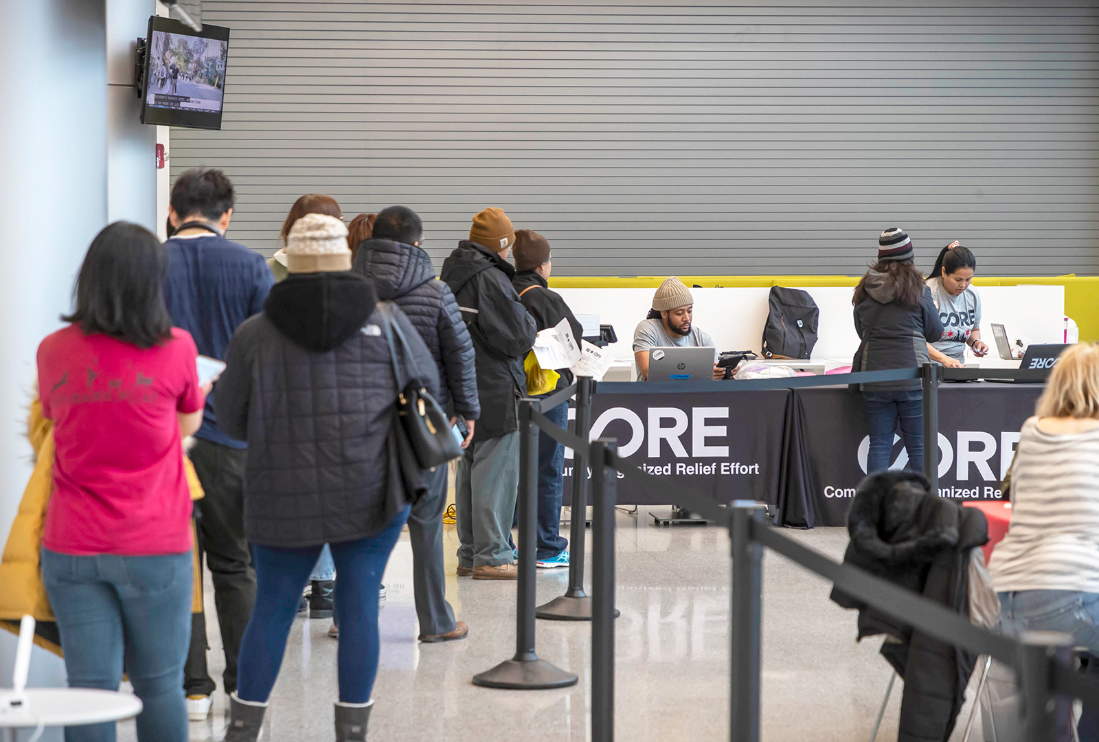 Community members lines up at a vaccination clinic in Chicago.