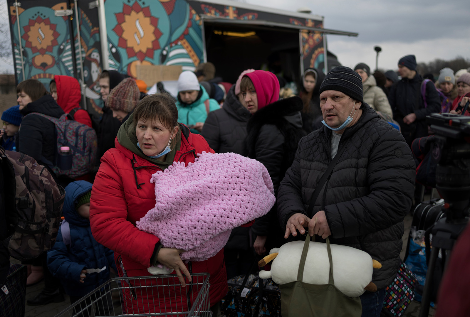 Ukrainian refugees crossing the border into Poland at Medyka in early March 2022.