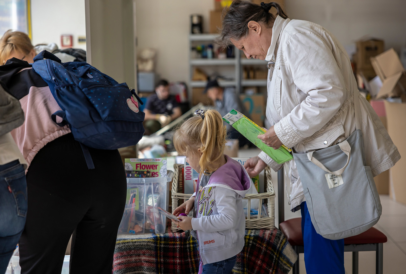 In May 2022, Ukrainian refugees in Rzeszow picked items from a free store supported by CORE in Rzeszow.