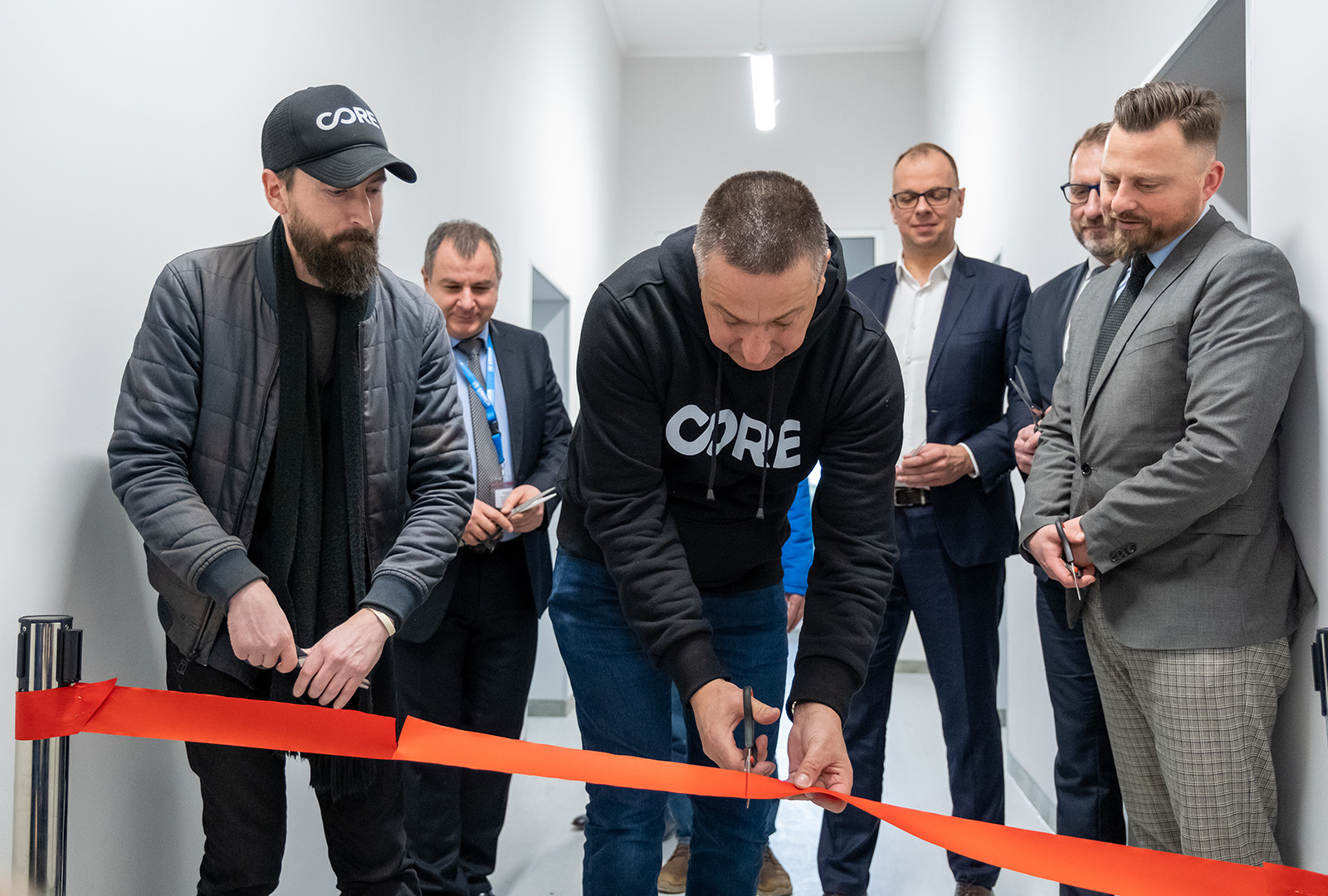 A ribbon cutting ceremony for one of the four public buildings CORE renovated in partnership with UNHCR, the UN Refugee Agency, to provide short to mid-term shelter to Ukrainian refugees entering Poland in January 2023.