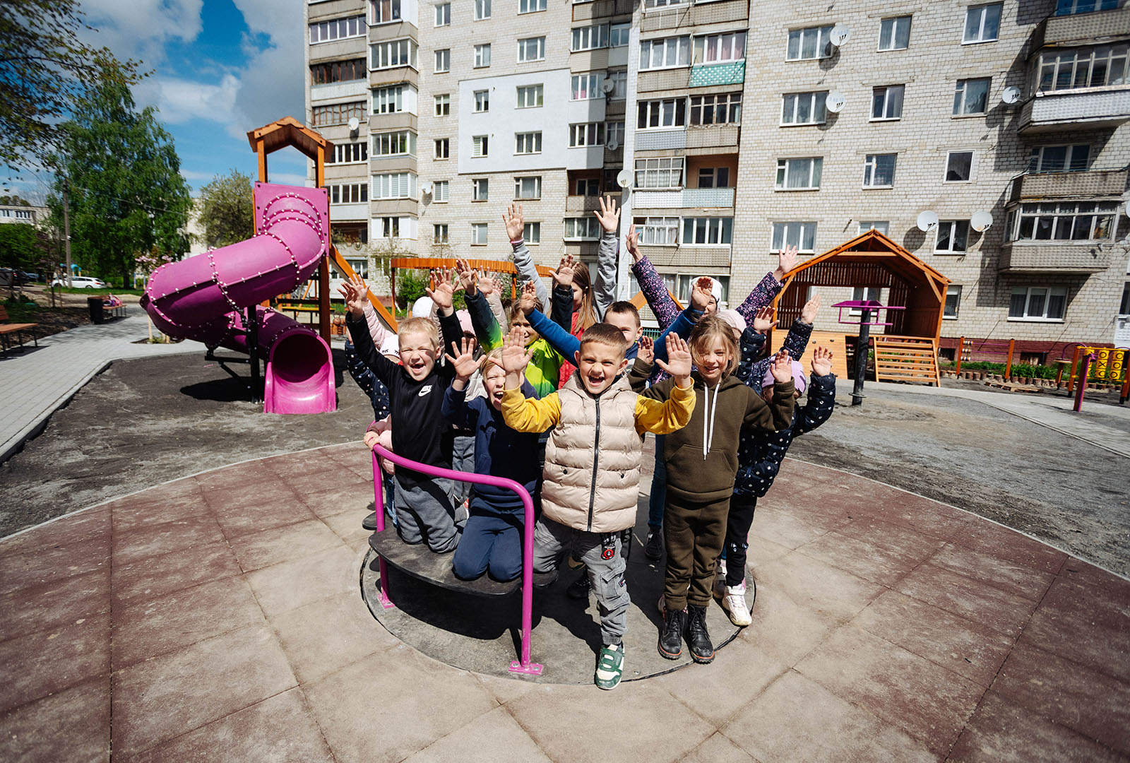 A group of displaced Ukrainian children enjoy a playground built by CORE and a local partner in Lviv Oblast in the Spring of 2024.