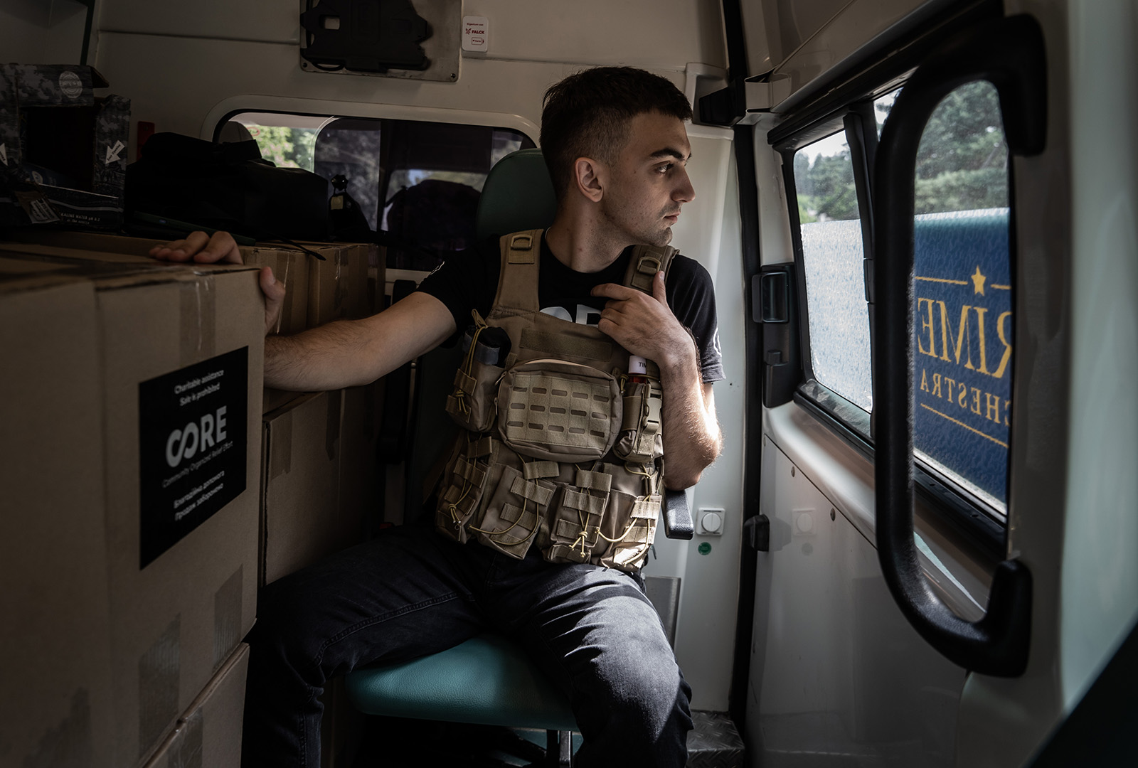 CORE staff in July 2023 traveling with a shipment of food and hygiene kits for a community near the front lines in Kharkiv.