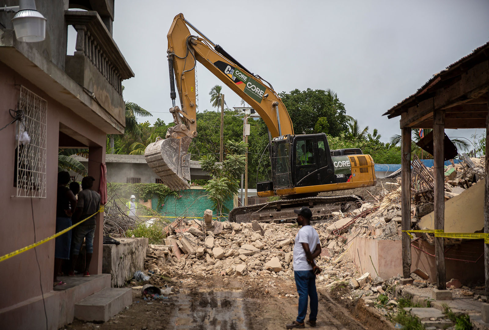 Heavy machinery demolishes an earthquake damaged structure in Haiti’s Grand Anse Department following the 7.2 magnitude earthquake that struck Haiti in August 2021. CORE launched an immediate response that provided emergency medical aid and mobilized heavy machinery to clear rubble and damaged structures.